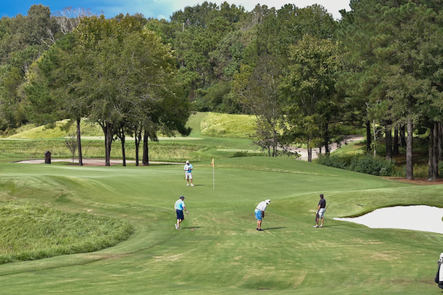 Golfers on the Robert Trent Jones Golf Trail at the Capitol Hill Golf Course in Prattville, Alabama. 
