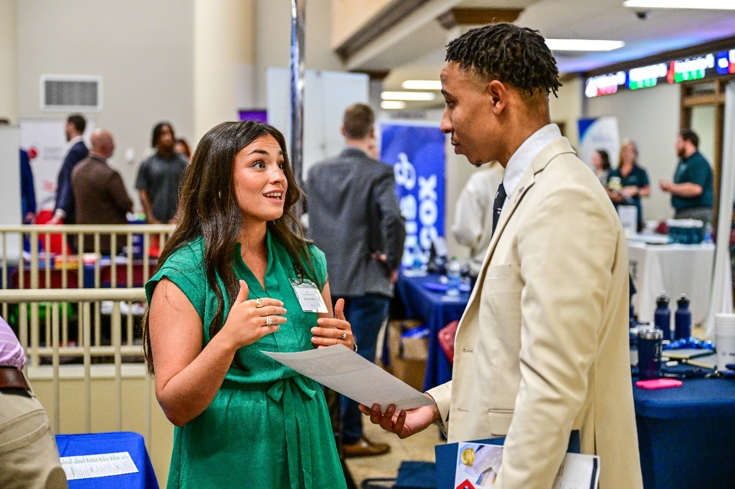 TROY students speaking with potential employers at a career fair in Lewis Hall