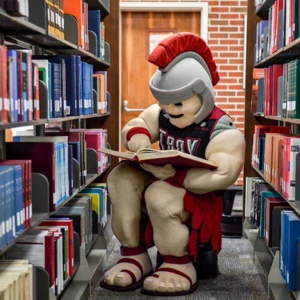 T-Roy studying in the library