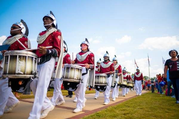 SOTs marching into the football stadium