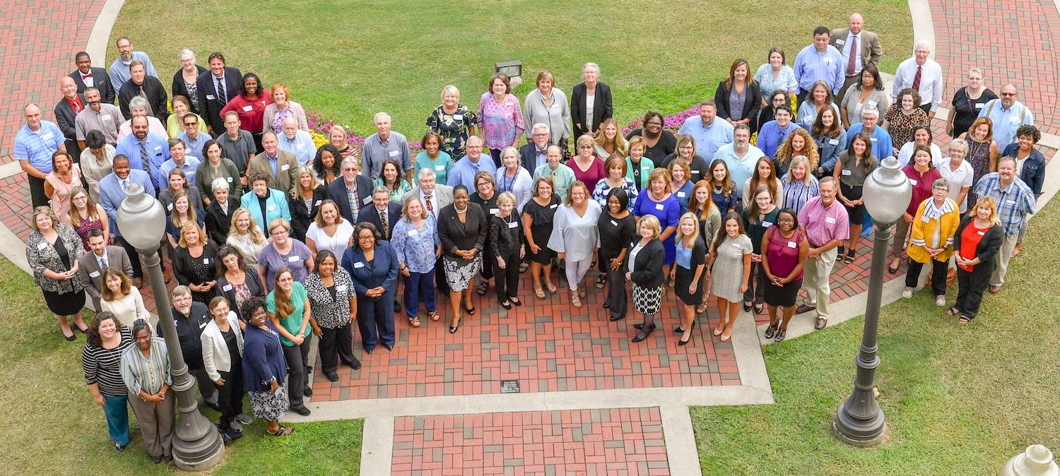 College of Education Faculty and Staff in front of Hawkins Hall