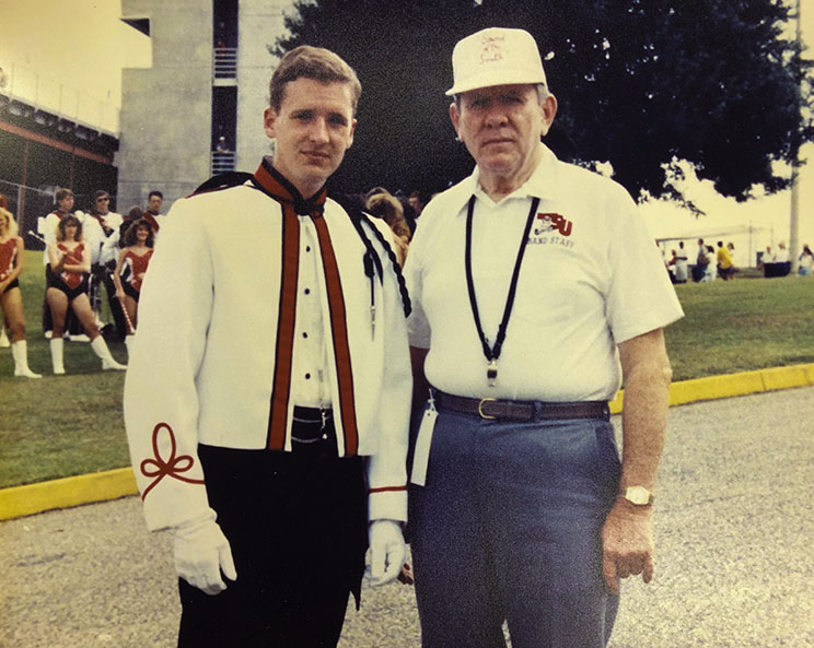 Dr. Palmer, drum major, with Dr. Long, band director