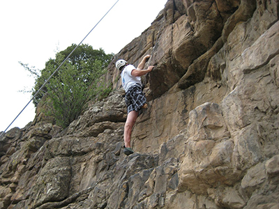 Luke Murphy rock climbing.
