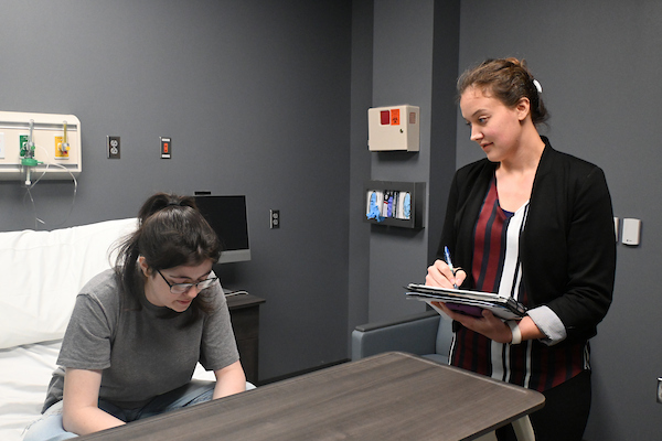 social work students participating in a simulation of a hospital setting at Jones Hall
