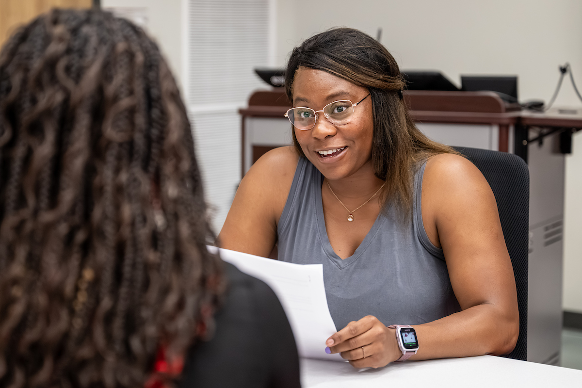 Sport Psychology student consulting with a student athlete