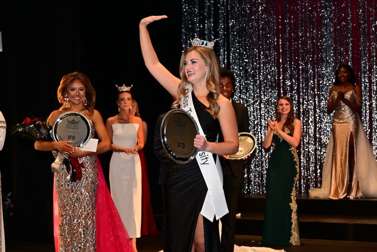 Gracen Murphy waving after winning Miss TROY