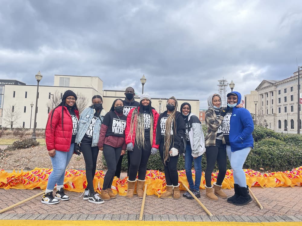 a group of high school volunteers at mlk parade