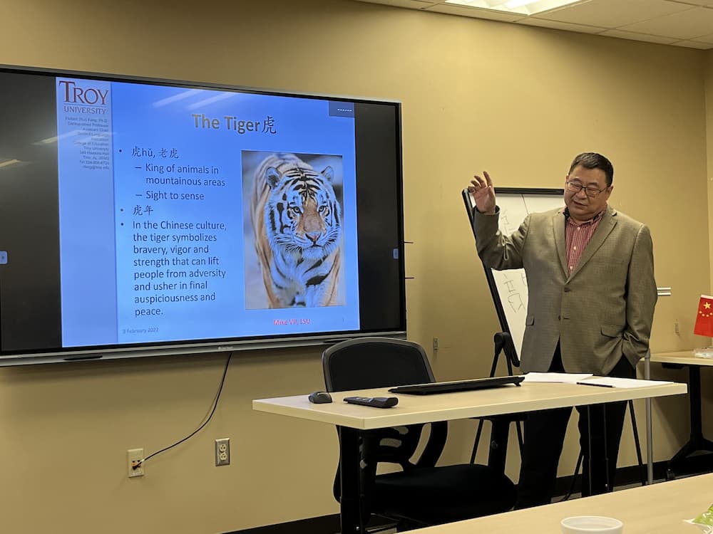 Dr. Feng presenting the importance of the tiger during the Lunar New Year