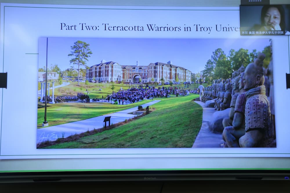 Dr. Fang Li talking about the Terracotta warriors at Troy University, the largest display of these warriors outside of China