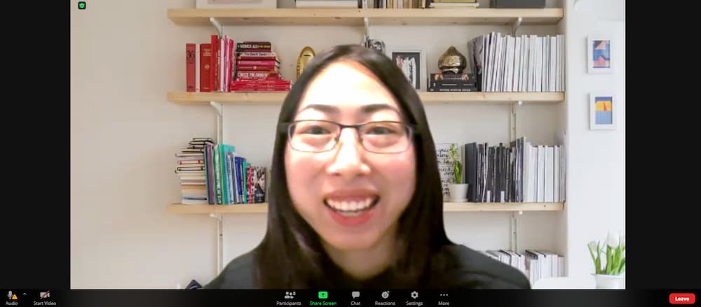 Photo of Xixi greeting everyone before her presentation