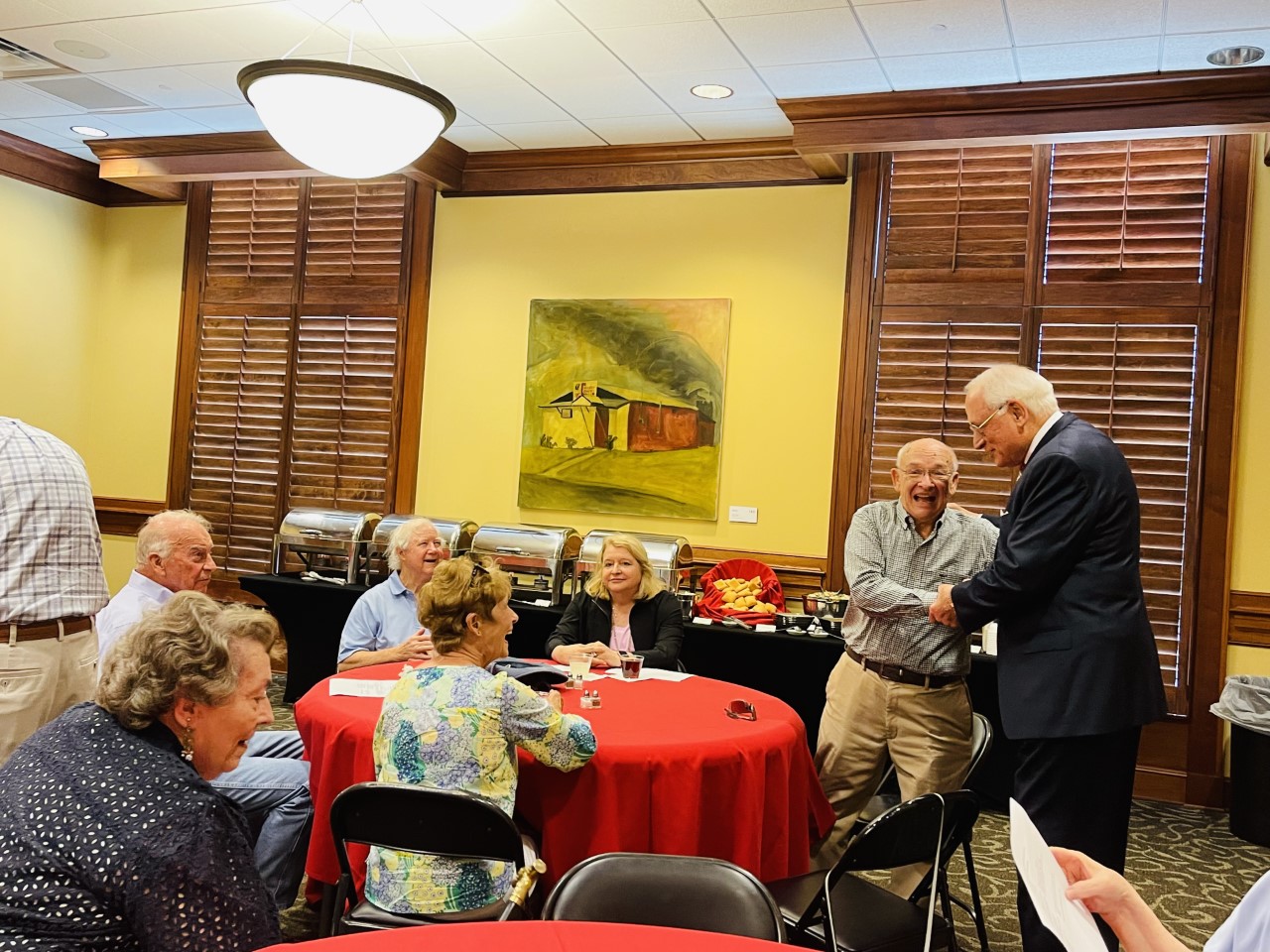 Sunday School class having lunch with Chancellor Hawkins