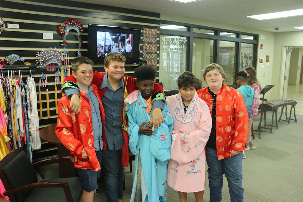 Group of students in traditional Chinese clothing
