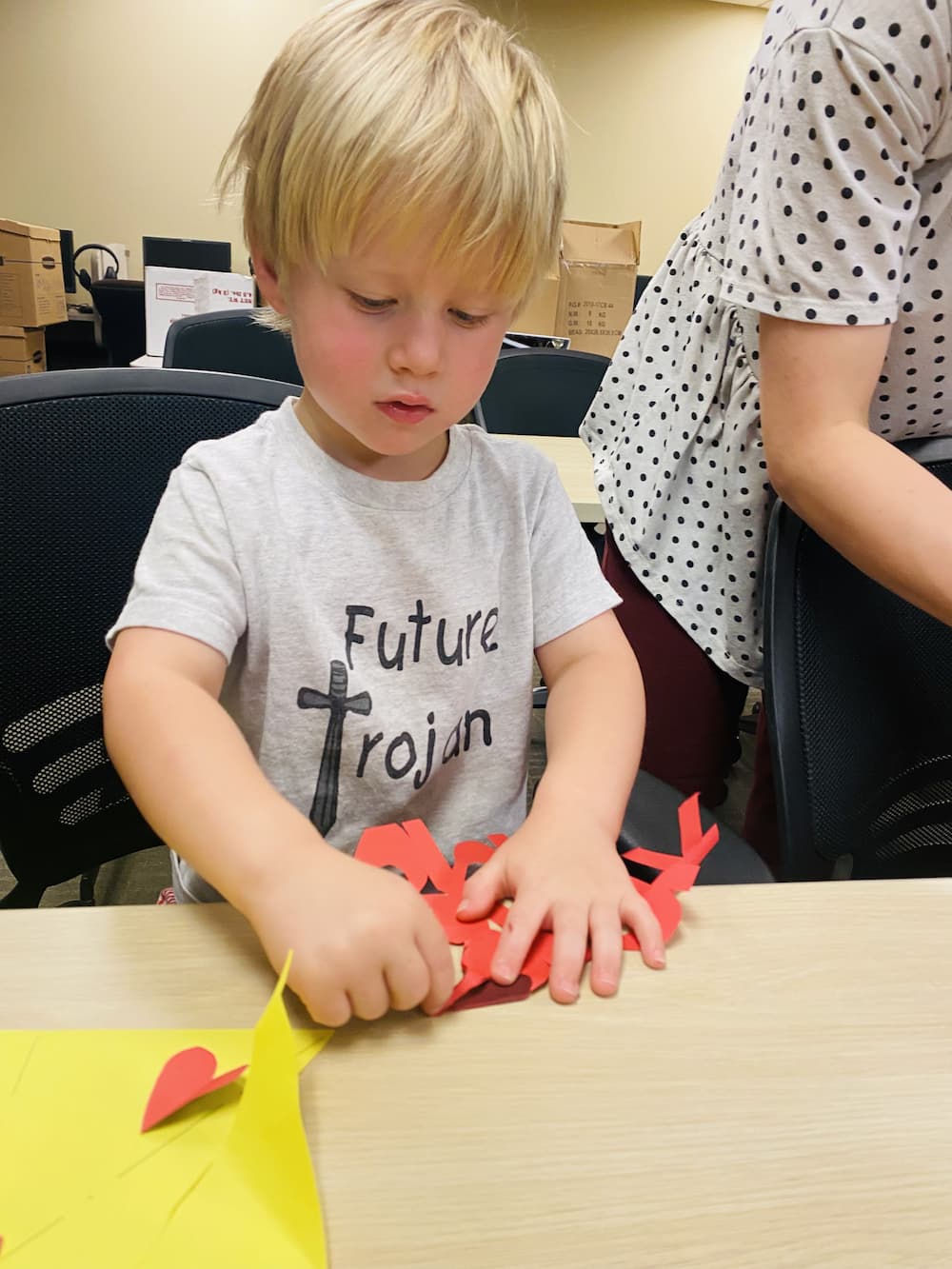 Students practice paper cutting