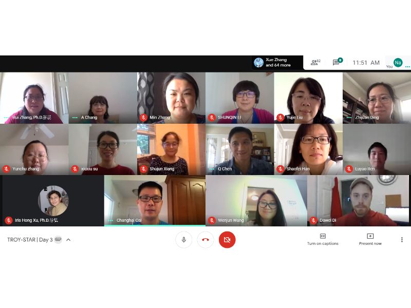 The participants pose for a virtual group picture. 