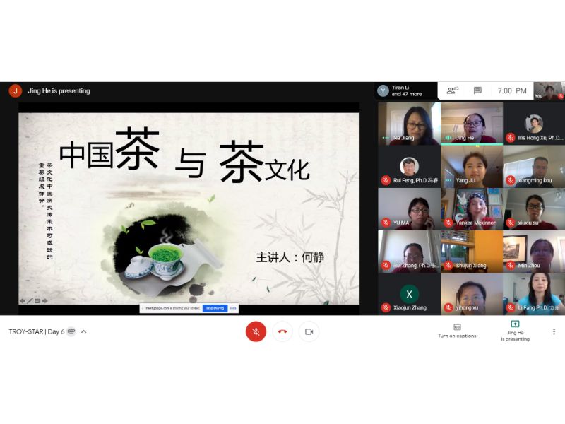 Ms. He Jing opens her presentation on Chinese tea culture with a calmly colored slide.Ms. He Jing opens her presentation on Chinese tea culture with a calmly colored slide.