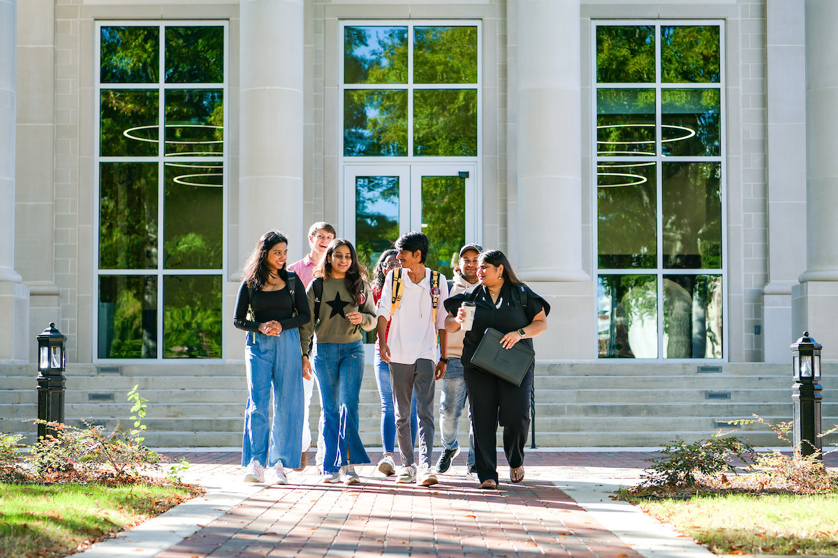 Students walking in front of the center for materials and manufacturing sciences