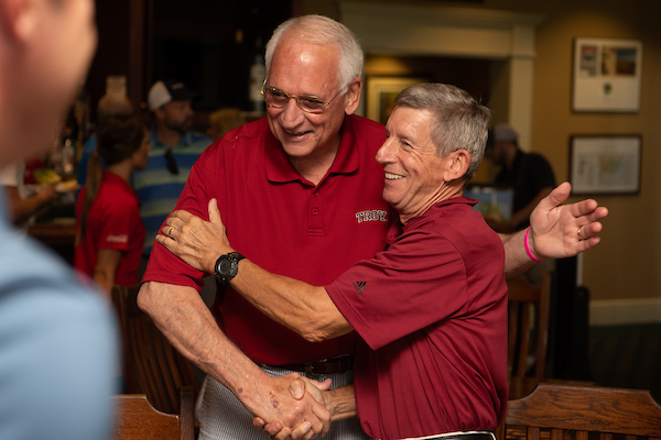 Dr. John W. Schmidt and Chancellor Hawkins at the 2017 tournamen