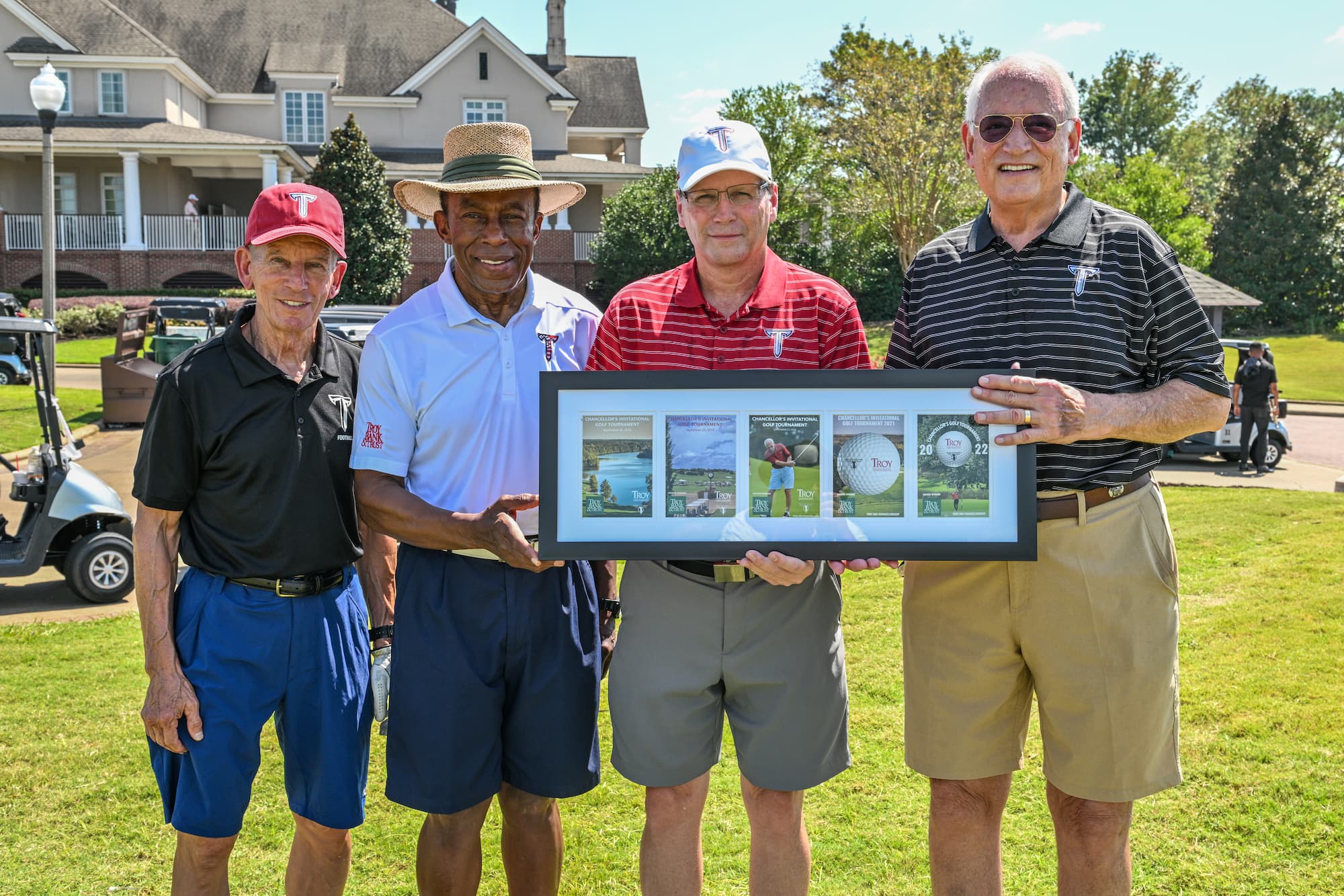 Chancellor Hawkins presenting award to Troy Bank and Trust