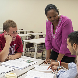 Staff helping students