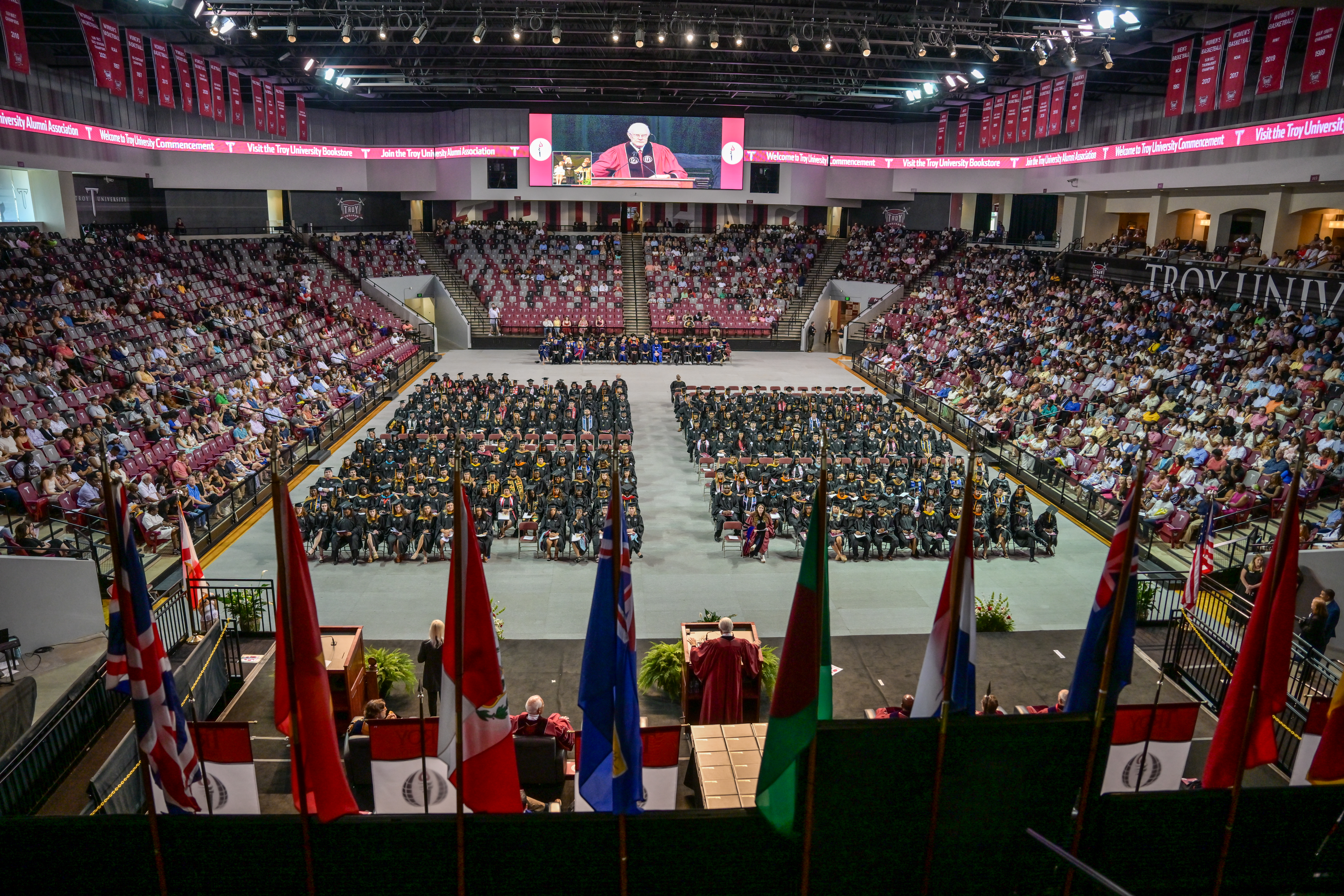 Dr. Gaylon McCollough delivers the keynote address during the Summer Commencement ceremony in Trojan Arena.
