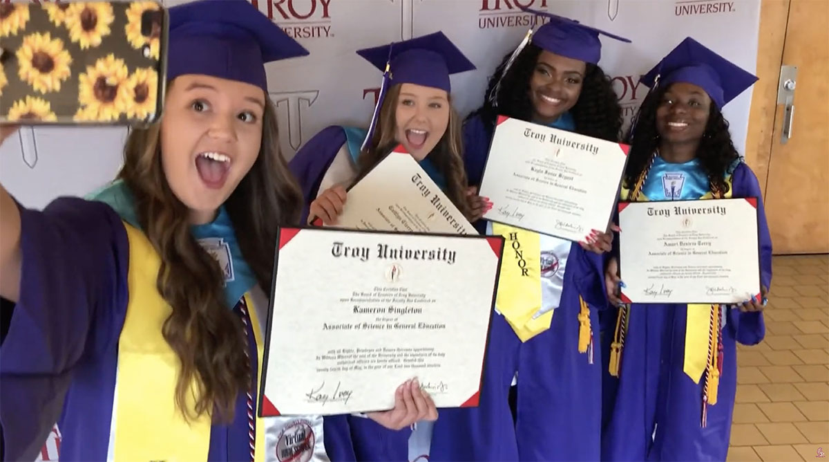 ACCELERATE students standing with their certificates.