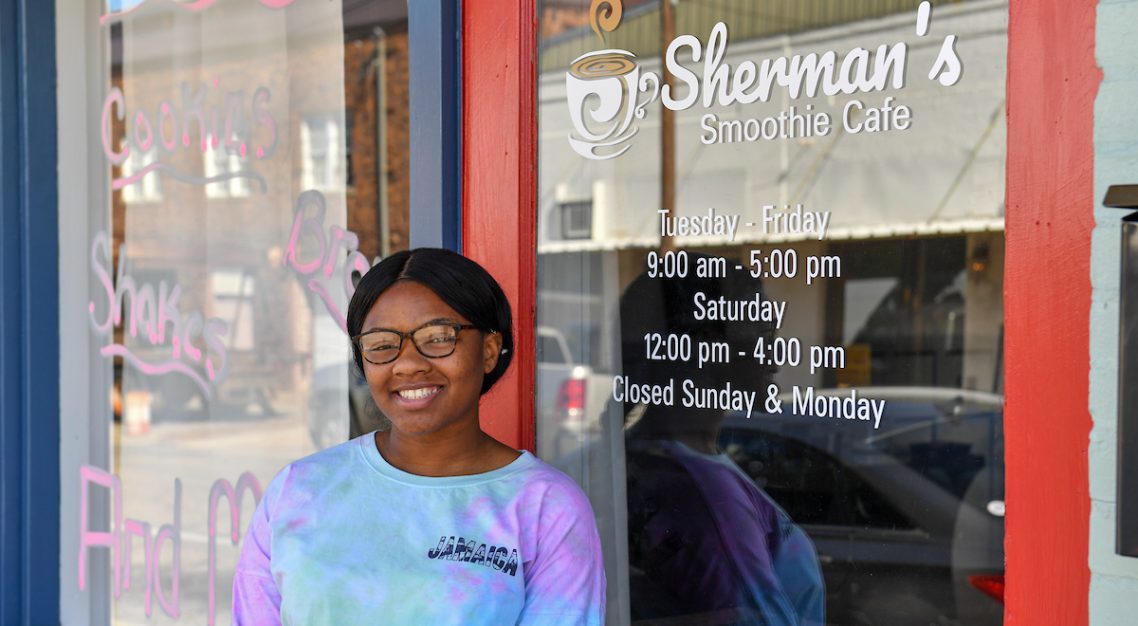 small business owner Charmin Harvey outside her cafe
