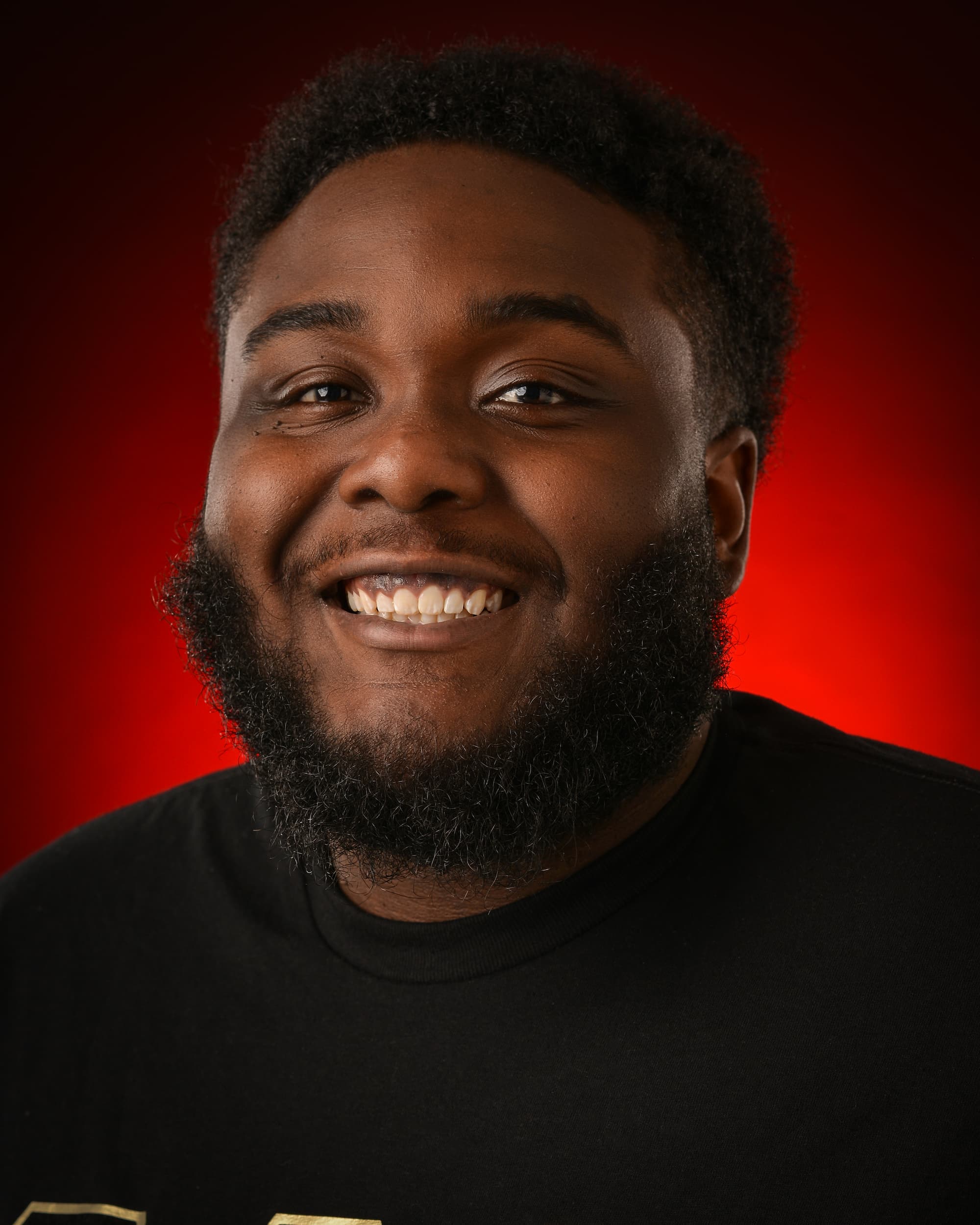 Headshot of Myles Camel.