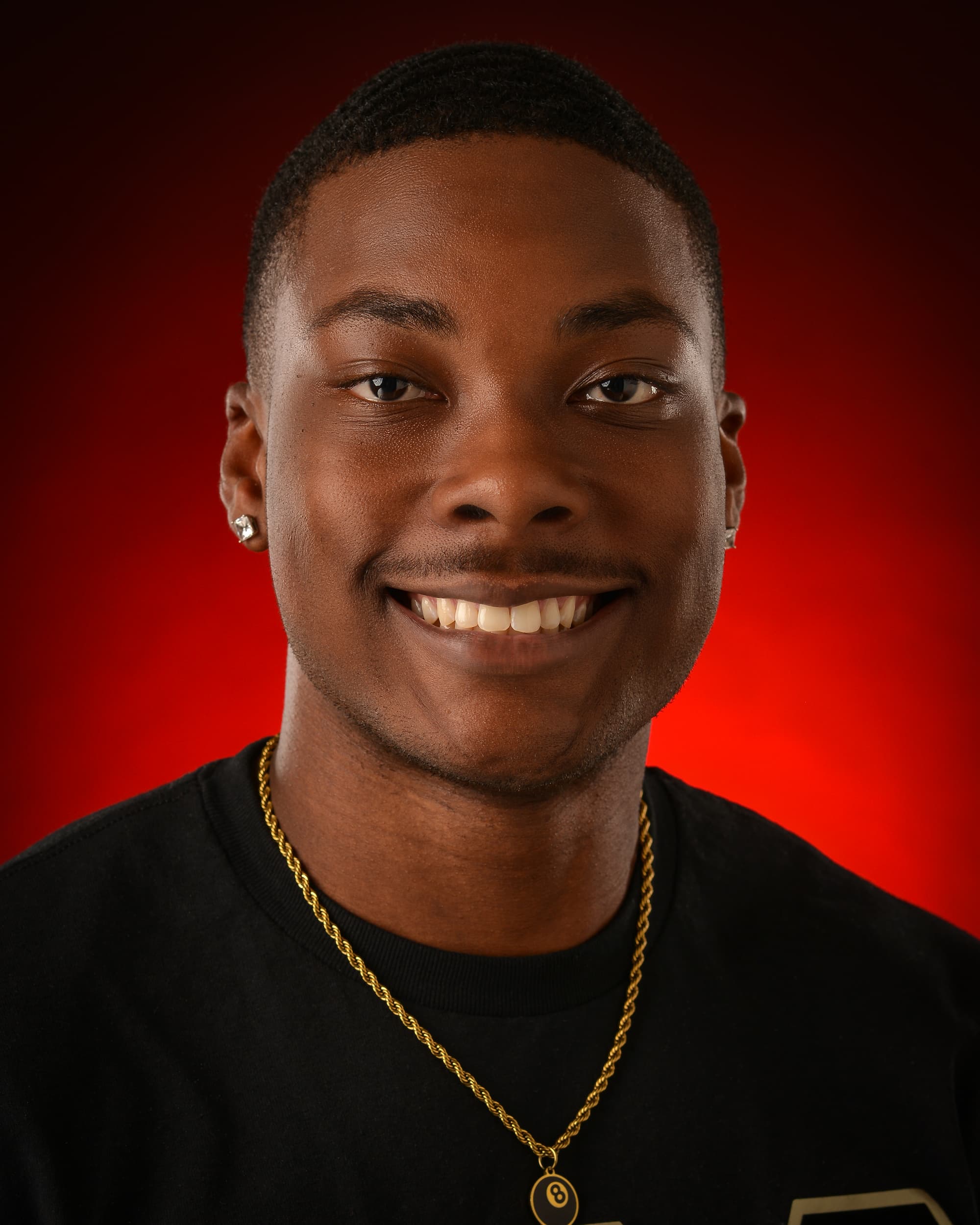 Headshot of Qwien Mason.