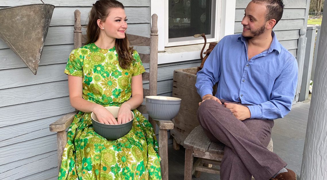 Tinyard Hill A young woman and young man in rocking chairs on the porch, looking at one another