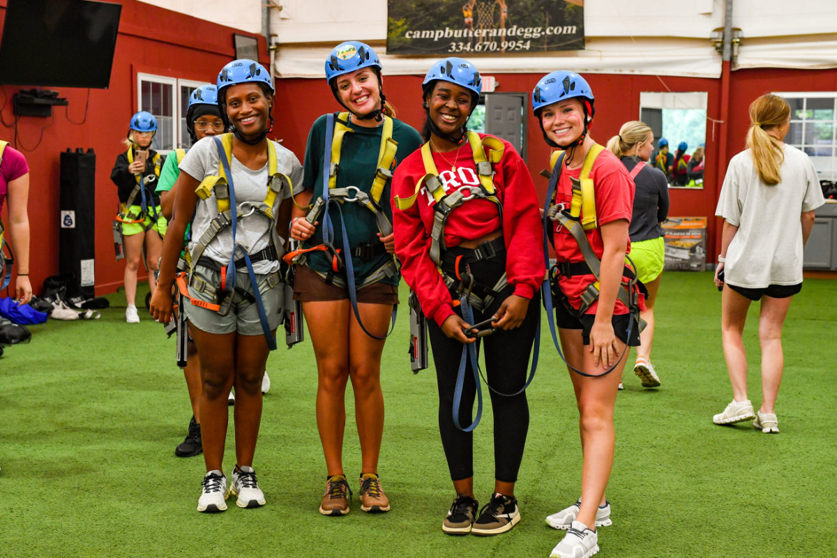 TROY students wearing zipline gear